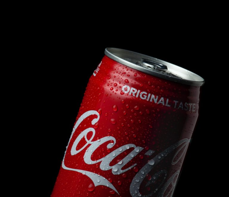coca cola can on black background